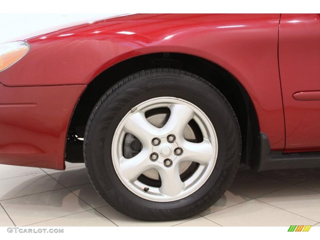 2003 Ford Taurus SE Wheel Photo #48877782