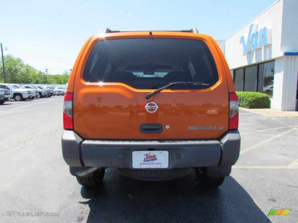 2003 Xterra XE V6 4x4 - Atomic Orange / Charcoal photo #6