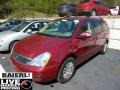 2011 Claret Red Kia Sedona LX  photo #3