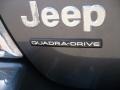 2003 Jeep Grand Cherokee Overland 4x4 Badge and Logo Photo