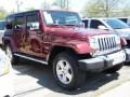 2009 Red Rock Crystal Pearl Jeep Wrangler Unlimited Sahara 4x4  photo #4