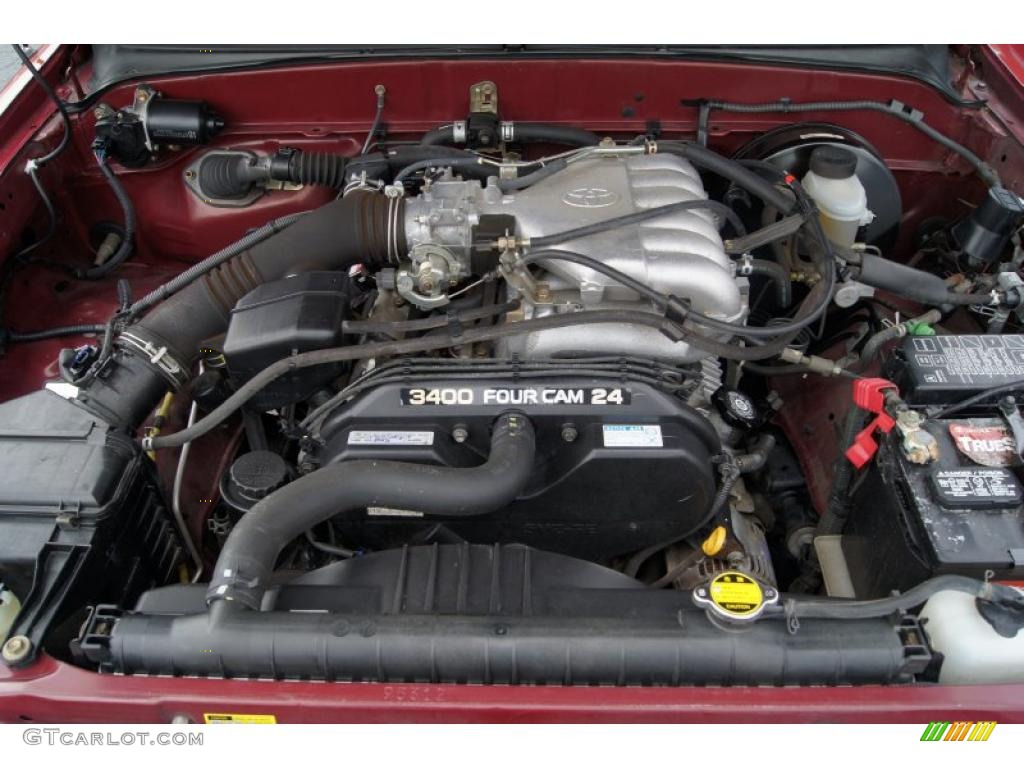 2002 Tacoma V6 TRD Xtracab 4x4 - Impulse Red Pearl / Charcoal photo #14