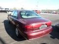 1999 Cabernet Red Metallic Ford Contour LX  photo #4