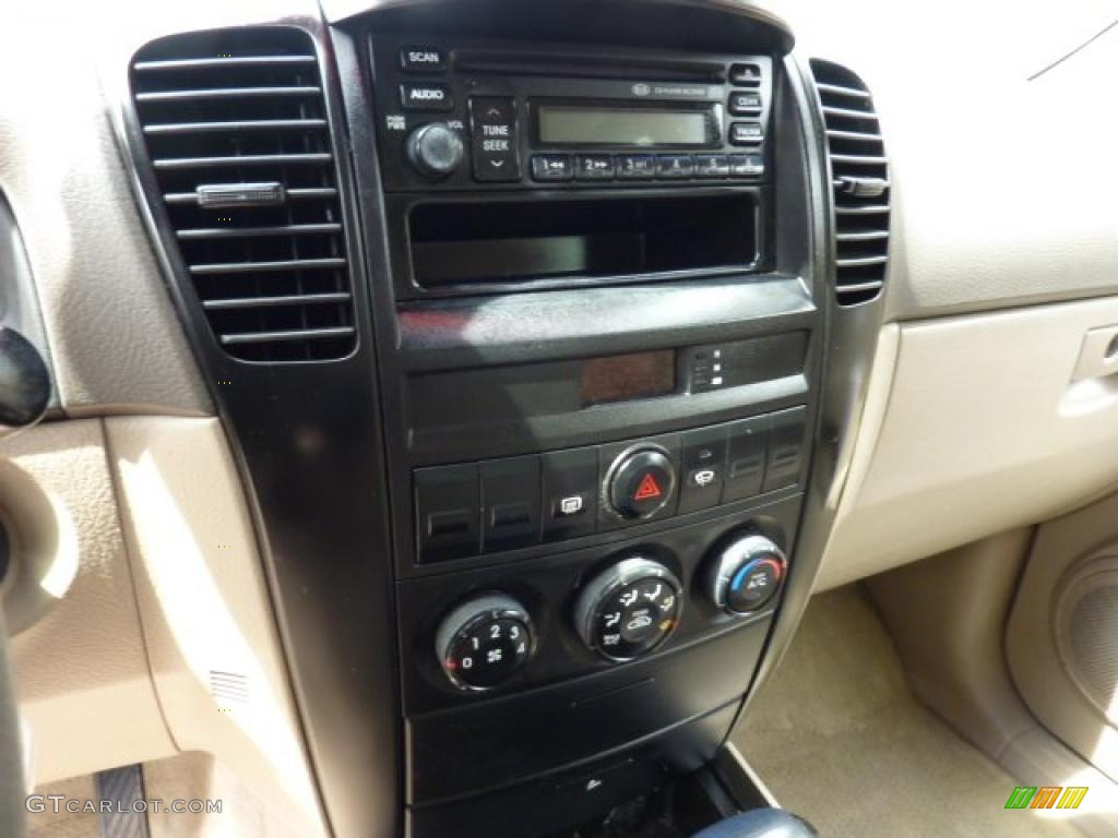 2004 Sorento LX 4WD - Ruby Red Metallic / Beige photo #18