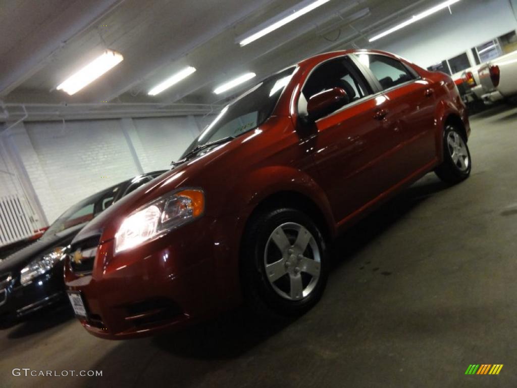 2010 Aveo LT Sedan - Sport Red / Charcoal photo #2