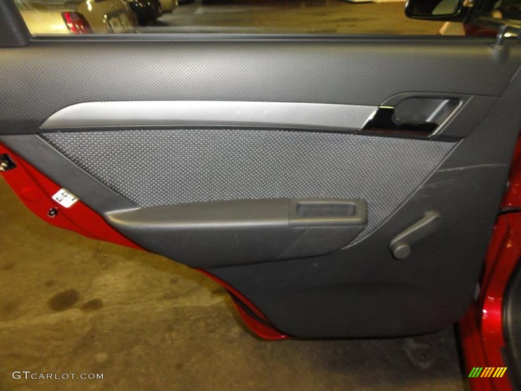 2010 Aveo LT Sedan - Sport Red / Charcoal photo #21