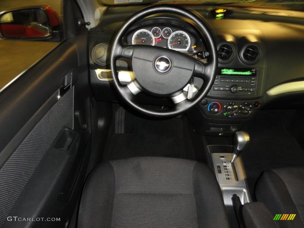 2010 Aveo LT Sedan - Sport Red / Charcoal photo #22