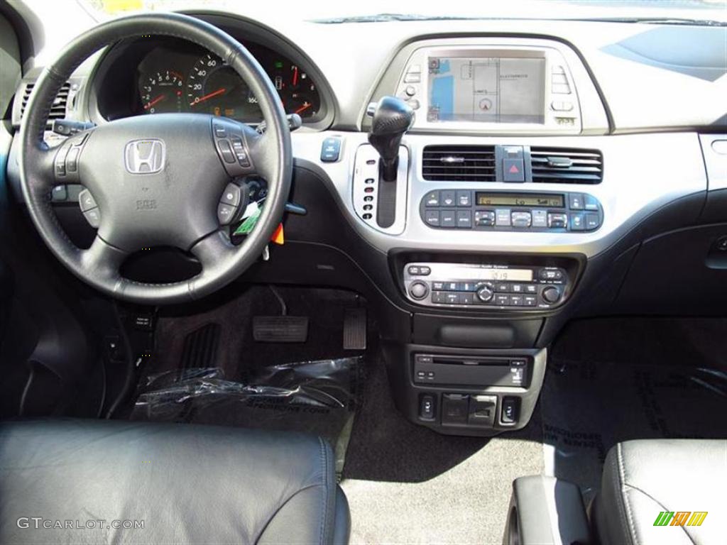 2010 Honda Odyssey Touring Black Dashboard Photo #49068101