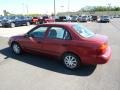 2002 Medium Red Metallic Chevrolet Prizm   photo #4