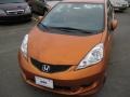 2011 Orange Revolution Metallic Honda Fit Sport  photo #2