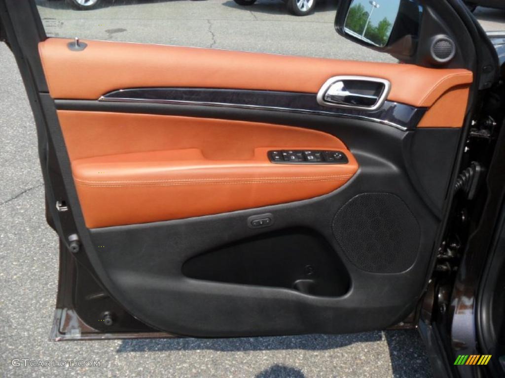 2011 Jeep Grand Cherokee Overland Summit New Saddle/Black Door Panel Photo #49120091
