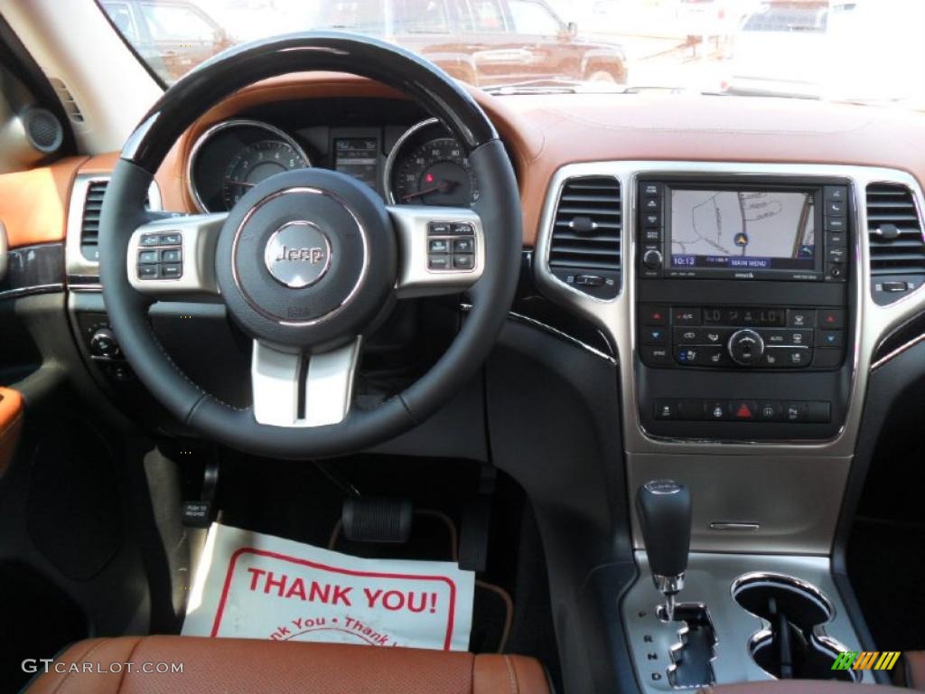 2011 Jeep Grand Cherokee Overland Summit New Saddle/Black Dashboard Photo #49120253