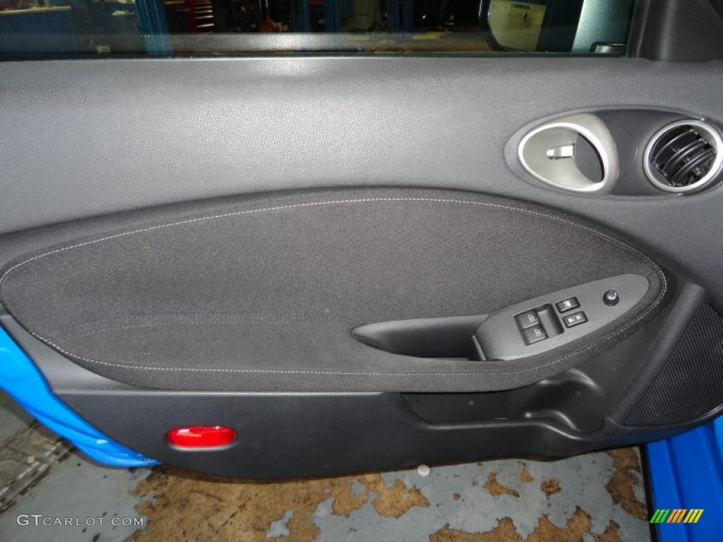 2009 Nissan 370Z Coupe Black Cloth Door Panel Photo #49122317