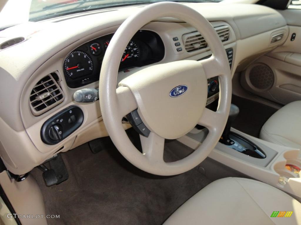 2004 Ford Taurus SES Sedan Medium Parchment Steering Wheel Photo #49123941