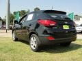 2011 Ash Black Hyundai Tucson GL  photo #5