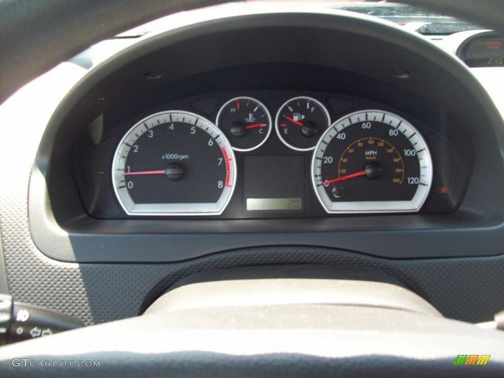 2011 Chevrolet Aveo LT Sedan Gauges Photo #49128503