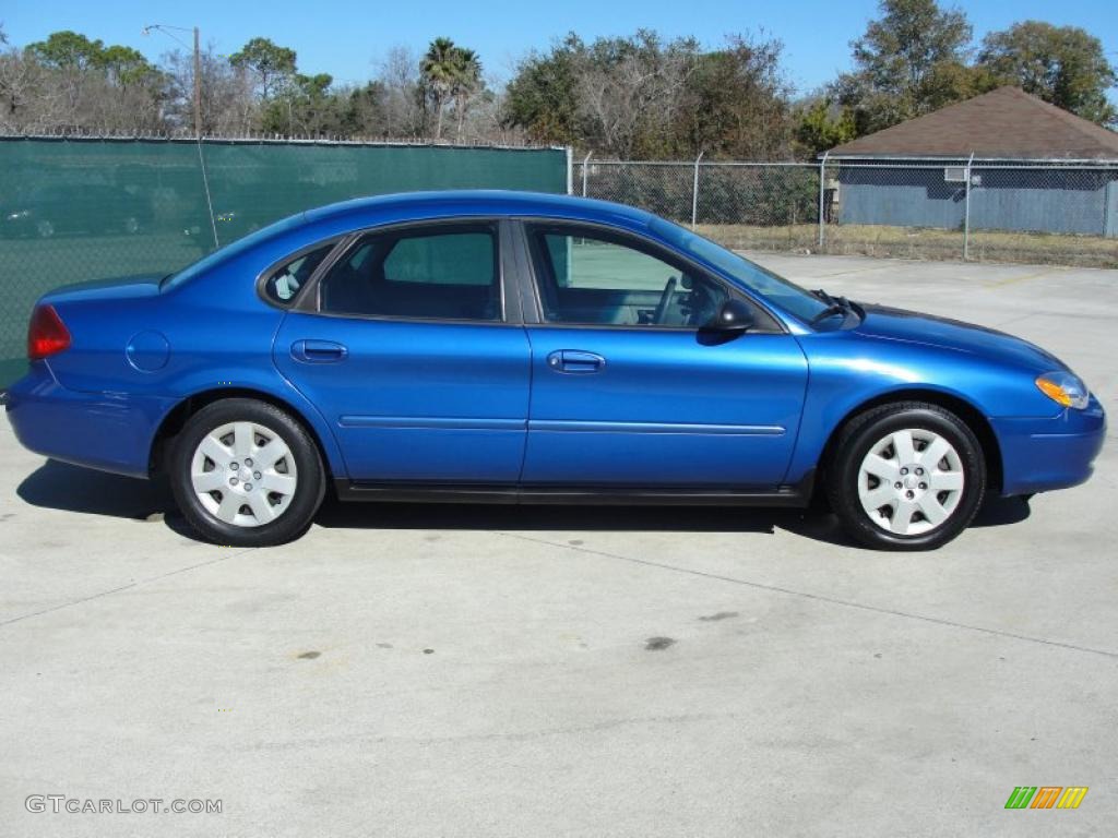 Patriot Blue Metallic 2003 Ford Taurus LX Exterior Photo #49129997