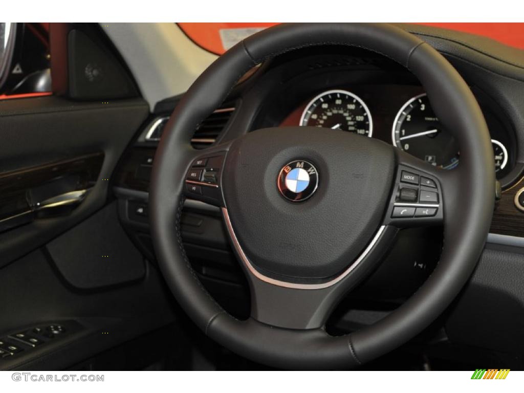 2012 BMW 7 Series 740i Sedan Black Steering Wheel Photo #49141097