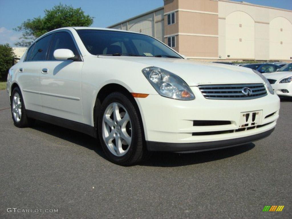 2004 G 35 x Sedan - Ivory White Pearl / Graphite photo #1