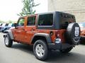 2011 Mango Tango Pearl Jeep Wrangler Unlimited Sport 4x4  photo #4