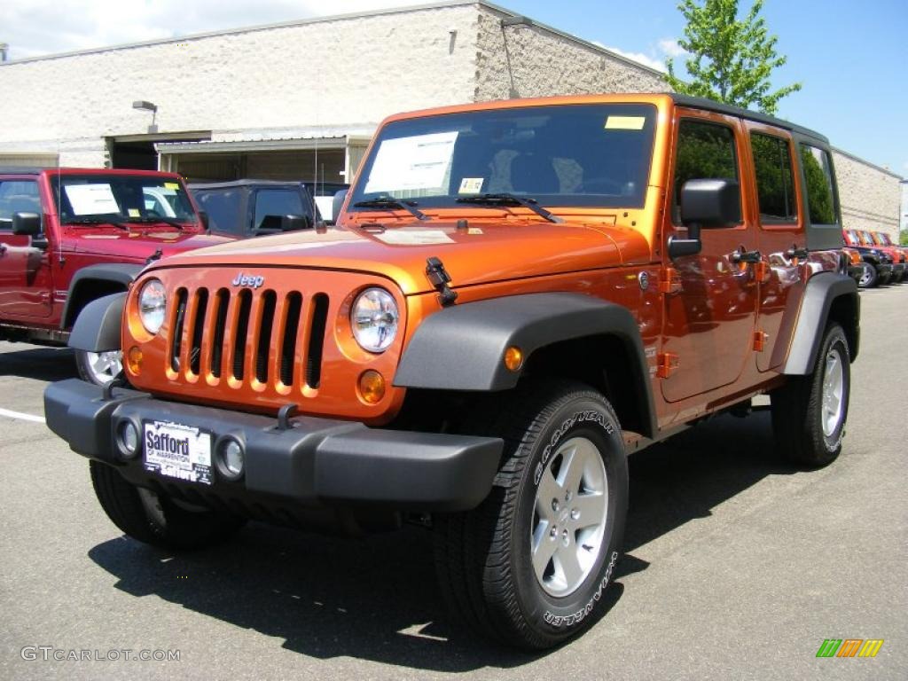 2011 Wrangler Unlimited Sport 4x4 - Mango Tango Pearl / Black photo #1