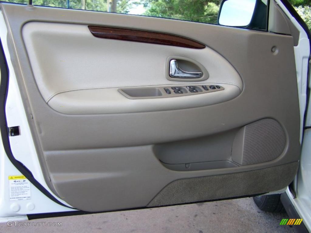 2002 Volvo S40 1.9T Taupe/Light Taupe Door Panel Photo #49186490