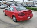 2004 Victory Red Pontiac Grand Am SE Sedan  photo #3