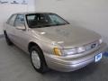 1994 Mocha Frost Metallic Ford Taurus GL #49195371