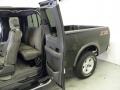 2002 Black Ford F150 XLT SuperCab 4x4  photo #17