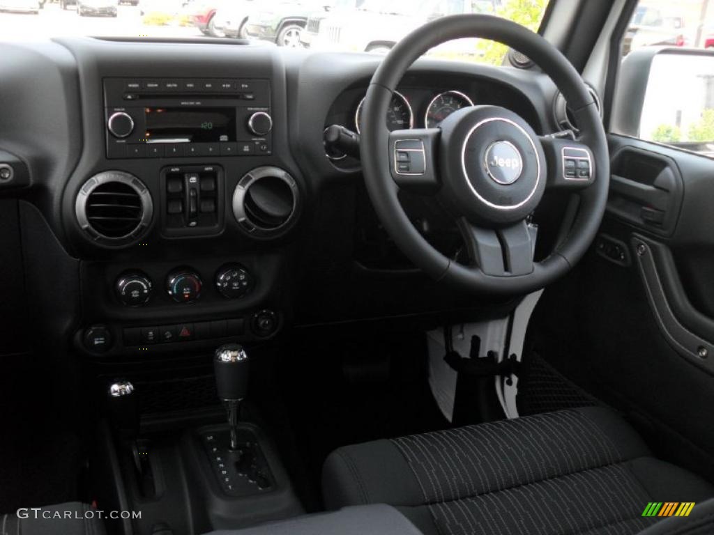 Black Interior 2011 Jeep Wrangler Unlimited Sport 4x4 Right Hand Drive Photo #49209158