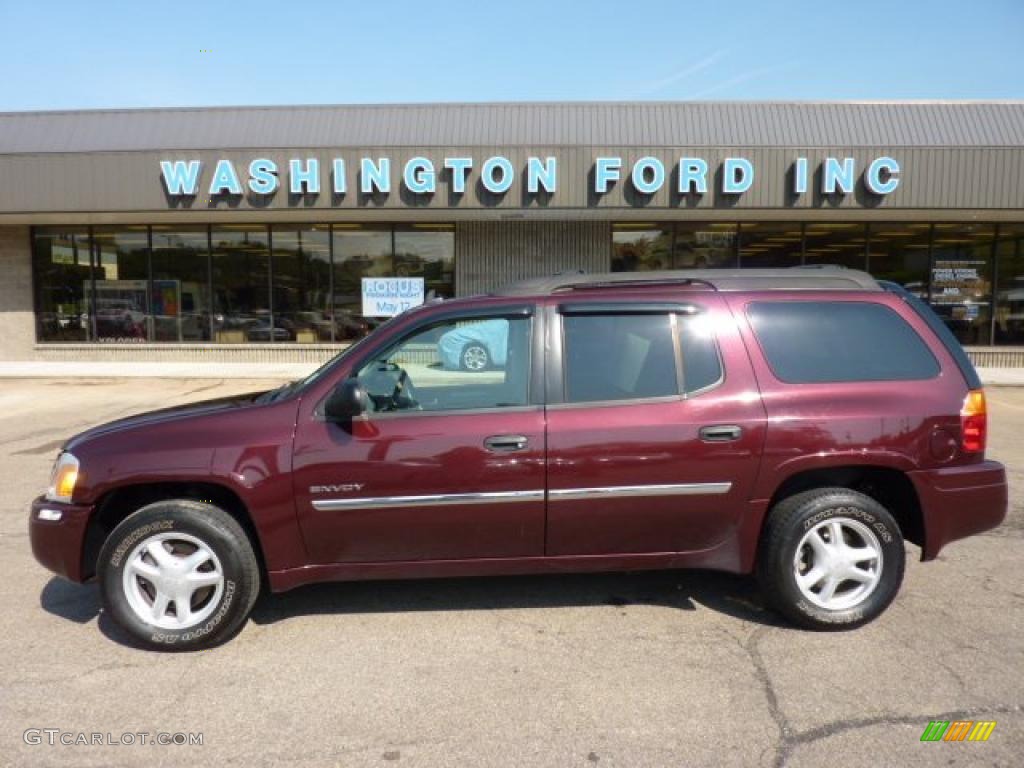 2006 Envoy XL SLT 4x4 - Cranberry Red Metallic / Ebony Black photo #1