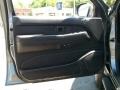 2004 Nissan Pathfinder Charcoal Interior Door Panel Photo