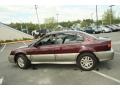 2000 Winestone Pearl Subaru Outback Limited Sedan  photo #10