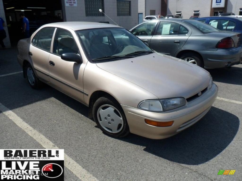 1997 Prizm  - Desert Sand Metallic / Charcoal photo #1