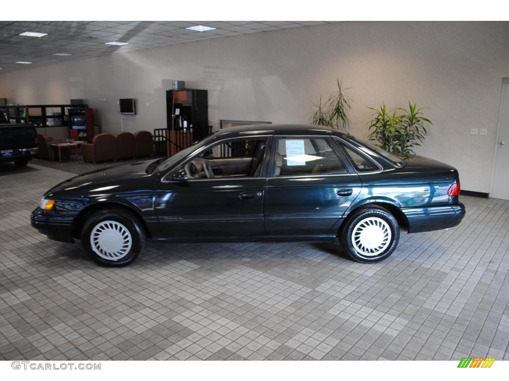 1994-deep-jewel-green-metallic-ford-taurus-gl-49299675-photo-5