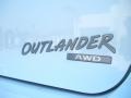  2003 Outlander XLS 4WD Logo