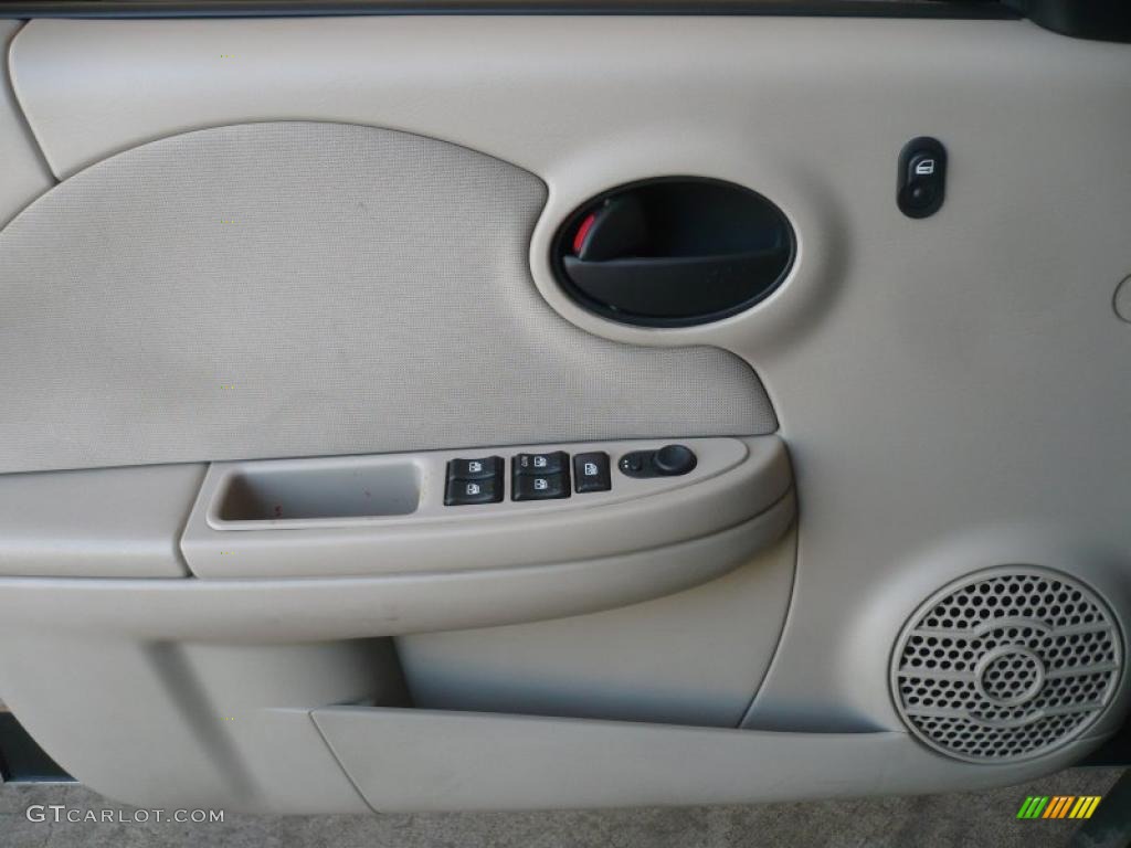 2004 Saturn ION 2 Sedan Tan Door Panel Photo #49323072