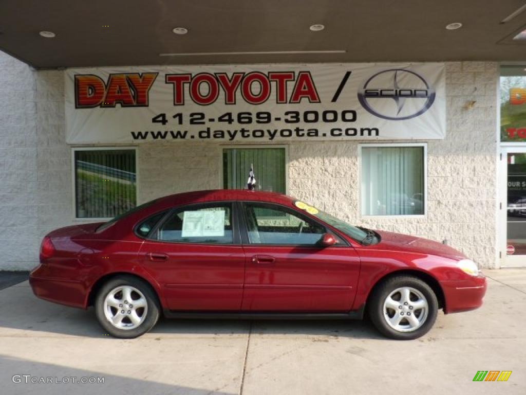 2002 Taurus SES - Matador Red Metallic / Medium Graphite photo #1