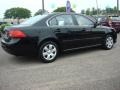 Ebony Black - Optima LX Photo No. 5