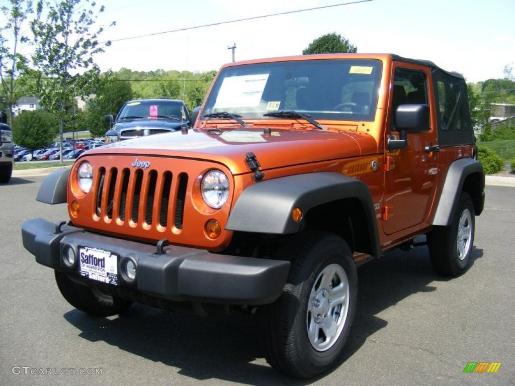 2011 Wrangler Rubicon 4x4 - Mango Tango Pearl / Black photo #1