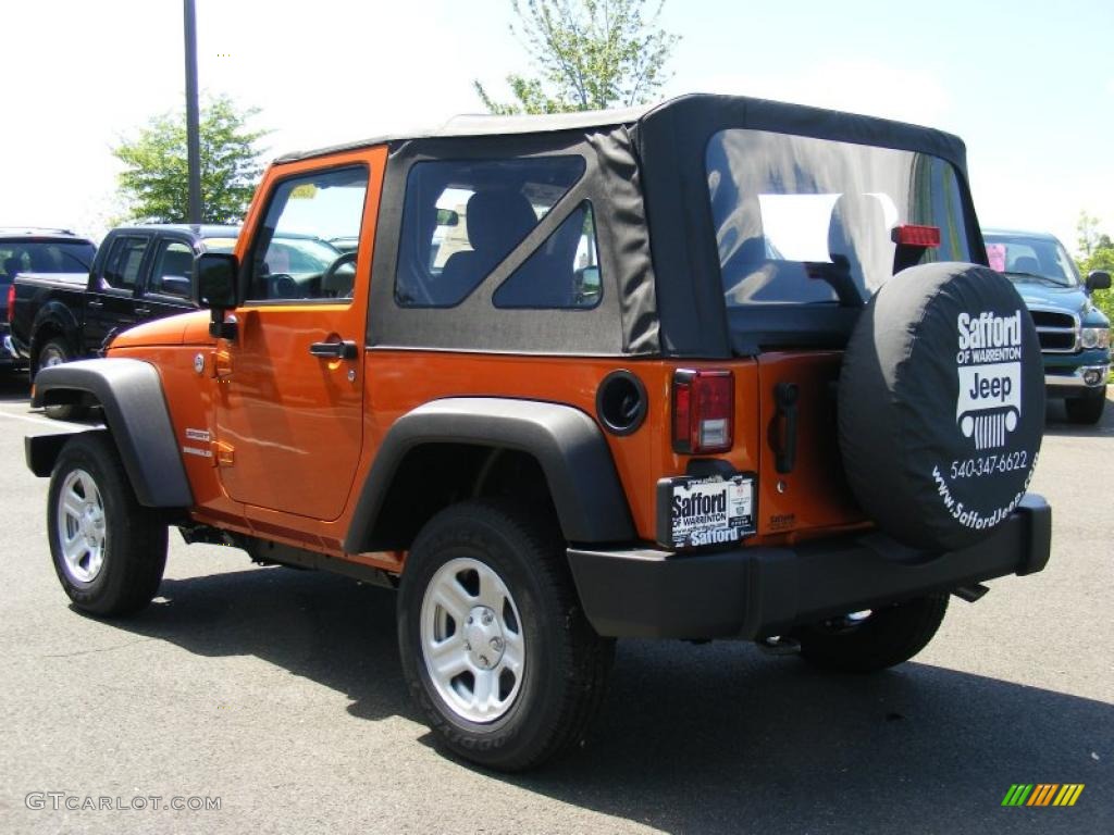 2011 Wrangler Rubicon 4x4 - Mango Tango Pearl / Black photo #4