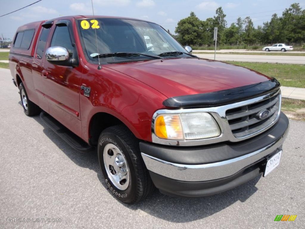 2002 F150 XLT SuperCab - Toreador Red Metallic / Medium Graphite photo #12
