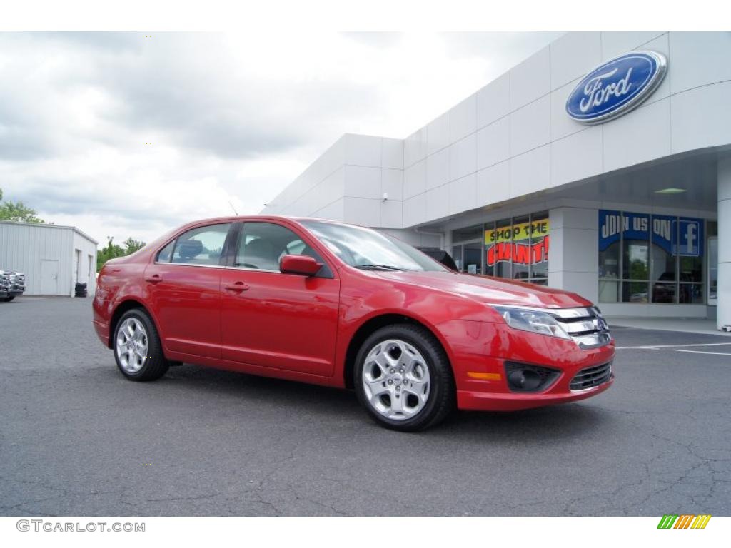 2011 Fusion SE - Red Candy Metallic / Medium Light Stone photo #1