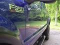 2003 Ford F350 Super Duty XLT SuperCab 4x4 Badge and Logo Photo