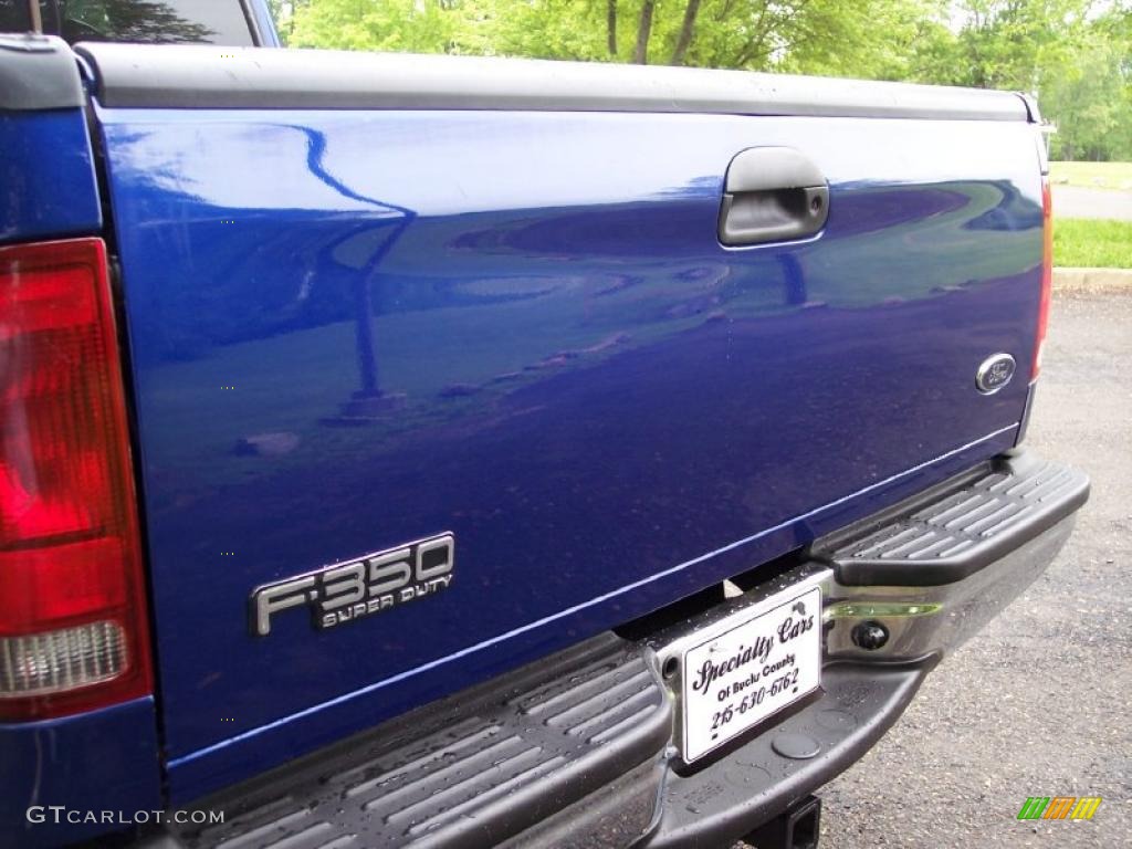 2003 F350 Super Duty XLT SuperCab 4x4 - Sonic Blue Metallic / Dark Flint photo #27