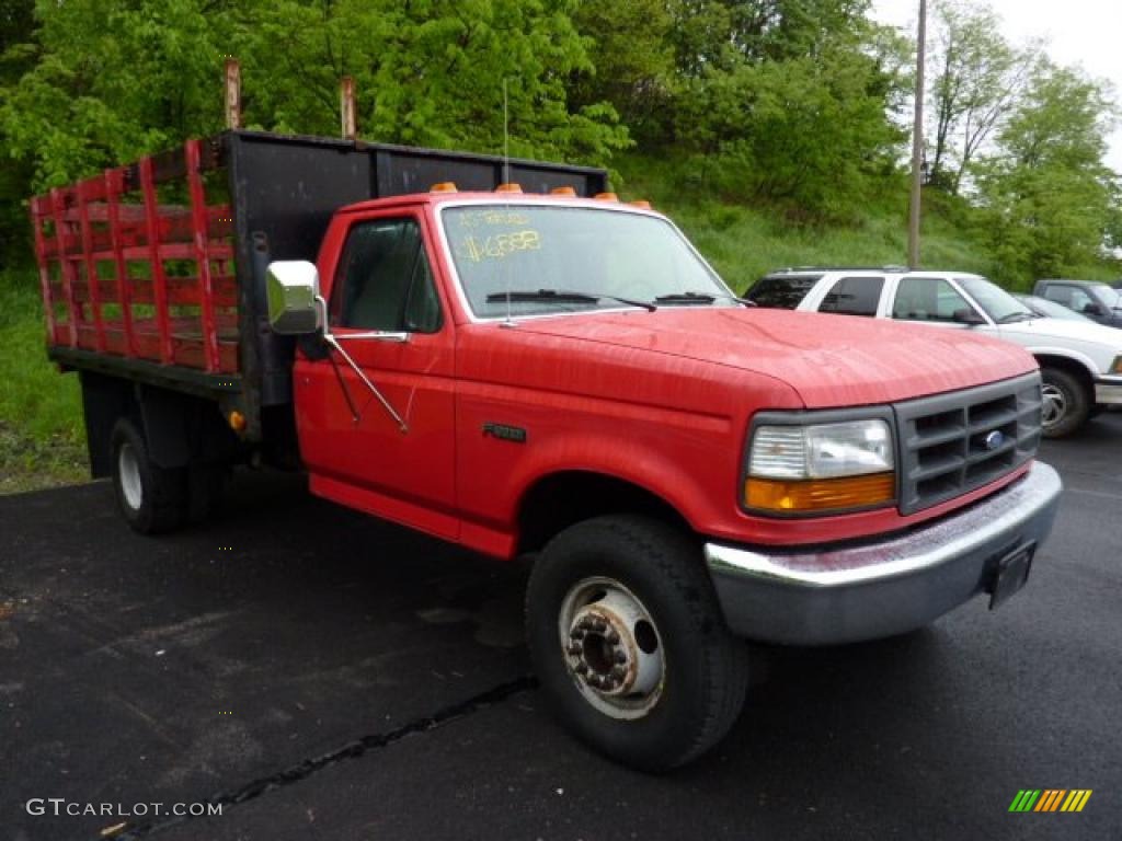 Vermillion Red 1997 Ford F350 XL Regular Cab Dually Stake Truck Exterior Photo #49406955