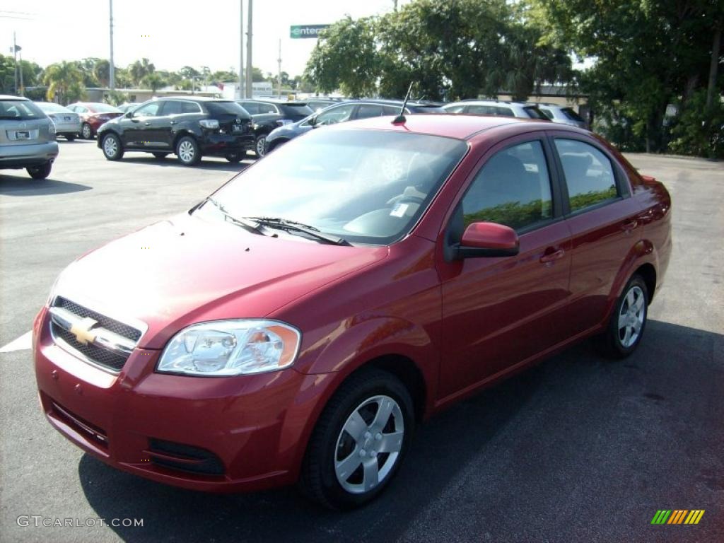 2010 Aveo LT Sedan - Sport Red / Charcoal photo #1