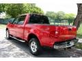 2002 Bright Red Ford F150 Lariat SuperCrew 4x4  photo #7