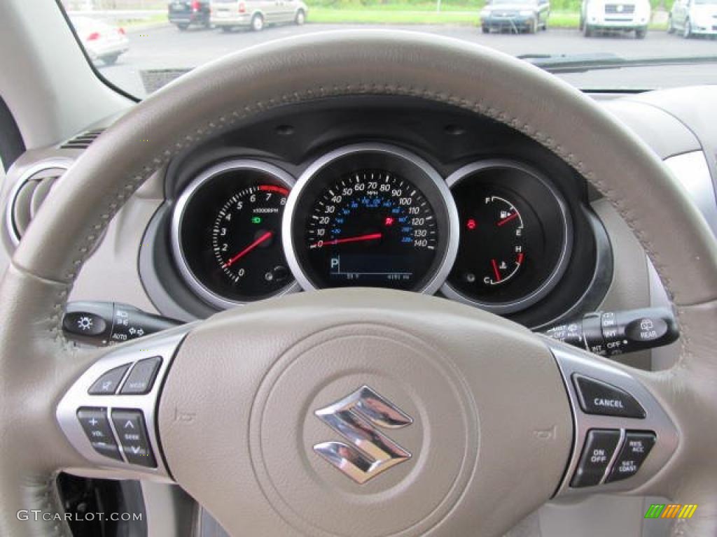 2009 Suzuki Grand Vitara XSport 4x4 Beige Steering Wheel Photo #49426414