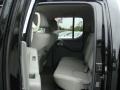 2009 Super Black Nissan Frontier SE Crew Cab 4x4  photo #13